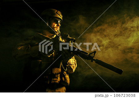 Bearded special forces soldier in the smoke Bearded special forces soldier in the smoke 106723038