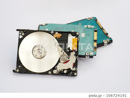 Detailed view of the inside of a hard disk drive in white background. HDD exterior view. Storage Concept. 106724191