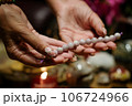 Jewelry made of natural stones bracelet in hands of woman 106724966