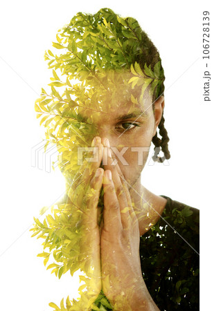 A man with palms at his face. A double exposure portrait 106728139