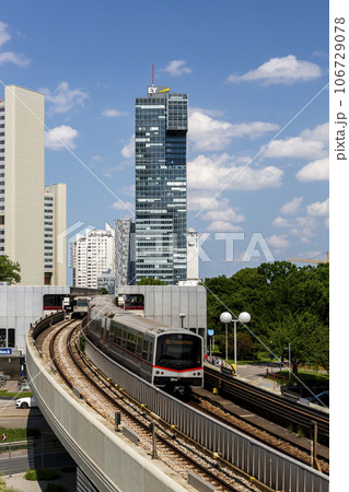 Metro train on the background of Vienna International Center "Donau-City" Metro train on the background of Vienna International Center "Donau-City" 106729078