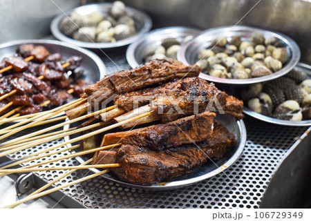 Grilled beef ribs bbq in Jalan Alor street food in Kuala Lumpur Grilled beef ribs bbq in Jalan Alor street food in Kuala Lumpur 106729349