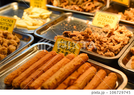 Fried cheese sausages in the street food Jalan Alor in Kuala Lumpur Fried cheese sausages in the street food Jalan Alor in Kuala Lumpur 106729745