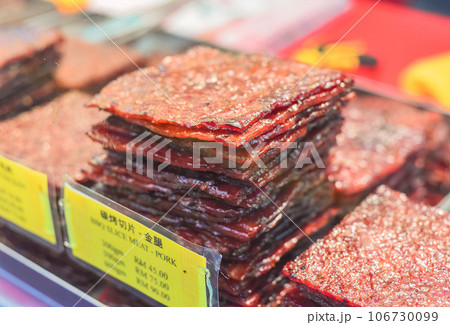 Bbq slice meat pork in the street food Jalan Alor in Kuala Lumpur 106730099
