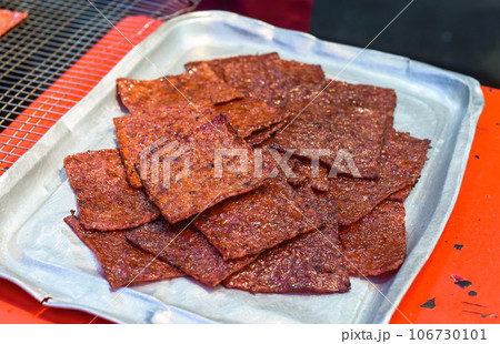 Bbq slice meat pork in the street food Jalan Alor in Kuala Lumpur 106730101