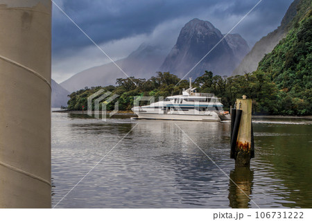Photograph of the boat harbour in Milford Sound on the South Island of New Zealand Photograph of the boat harbour in Milford Sound on the South Island of New Zealand 106731222