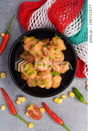Reforma sriracha mayonnaise shrimps on table with mexican decorations Reforma sriracha mayonnaise shrimps on table with mexican decorations 106731677