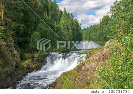 natural landscape with a clear waterfall on a forest water natural landscape with a clear waterfall on a forest water 106731756
