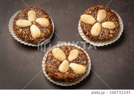 Portuguese marzipan delicacy regional sweet fig cheese. Gourmet sweets from the Algarve Portugal on a marble background close-up. 106732245
