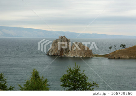 Shore of Lake Baikal. Olkhon Island, Shaman Rock Shore of Lake Baikal. Olkhon Island, Shaman Rock 106739260