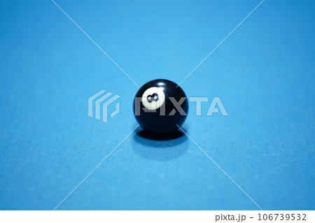 Ball number 8 in a game of billiards before it is struck 106739532