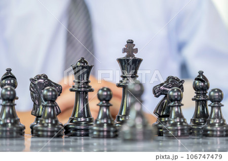 chess pieces, Businessman thinking for moving with background, challenges planning business strategy to success concept 106747479