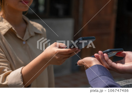Asia customer woman scan QR code payment and pick up purchase online shopping food, Grocery man delivers service organic vegetable and fruit 106747486
