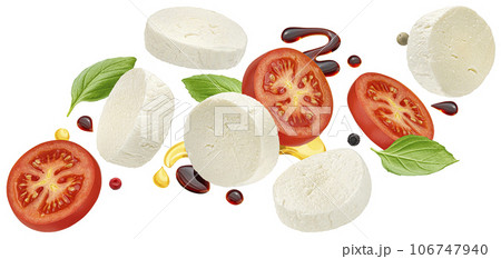 Mozzarella and tomato slices with basil and balsamic dressing isolated on white background Mozzarella and tomato slices with basil and balsamic dressing isolated on white background 106747940