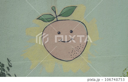 The painted wall in the building of the kindergarten. The color pictures drawn in the wall. education concept. The painted wall in the building of the kindergarten. The color pictures drawn in the wall. education concept. 106748753
