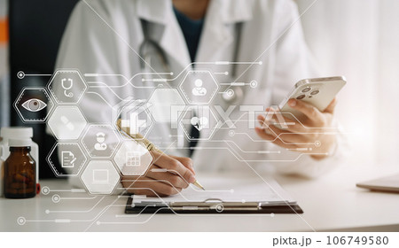 Medicine doctor hand working with modern digital tablet computer and smaetphone interface as medical network concept. Medicine doctor hand working with modern digital tablet computer and smaetphone interface as medical network concept. 106749580