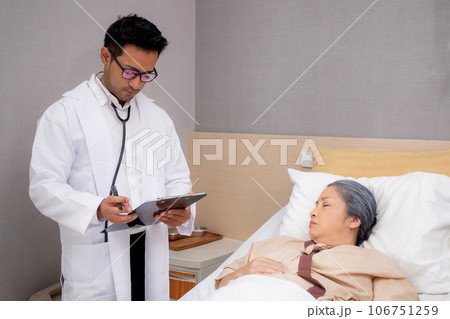 Doctor checkup and diagnostic with patient elderly woman for prescription. 106751259