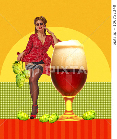Elegant, beautiful young woman leaning on dark foamy beer over bright background. Hops. Contemporary art collage. 106752349