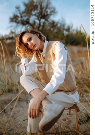 Portrait of elegant, luxury woman posing in nature. People, lifestyle, relaxation concept. 106755114