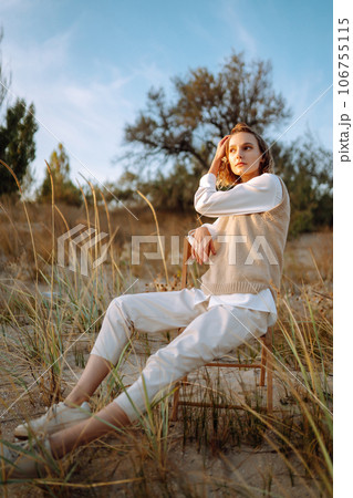 Portrait of elegant, luxury woman posing in nature. People, lifestyle, relaxation concept. 106755115