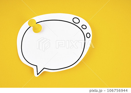 The Blank speech bubble and push pin on yellow background. 106756944
