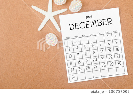 The December 2023 Monthly calendar with Starfish on wooden background. The December 2023 Monthly calendar with Starfish on wooden background. 106757005