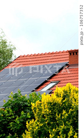 Installing a Solar Cell on a Roof. 106757352