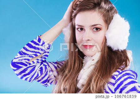 Young woman in wintertime. 106761839