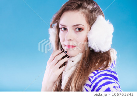 Young woman in wintertime. 106761843