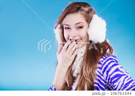 Young woman in wintertime. Young woman in wintertime. 106761844