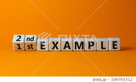 Turned a cubes and changed the expression '1 st example' to '2nd example'. Beautiful orange background. Business concept. Copy space. Turned a cubes and changed the expression '1 st example' to '2nd example'. Beautiful orange background. Business concept. Copy space. 106763312