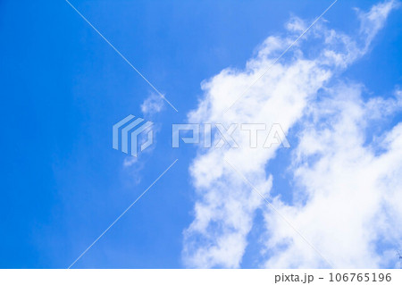 Cumulus clouds. White clouds on a blue background. 106765196
