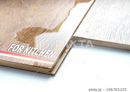 Laminate for the kitchen. Floor coverings for rooms with high humidity. Laminate for the kitchen. Floor coverings for rooms with high humidity. 106765205