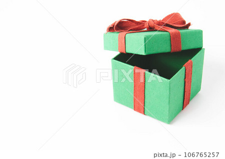 Present. Gift box with a bow. New Year's surprise. Red and green box with a gift Present. Gift box with a bow. New Year's surprise. Red and green box with a gift 106765257