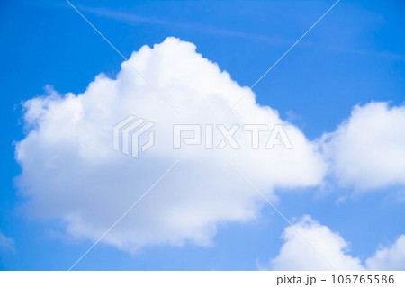 Cumulus clouds. White clouds on a blue background. 106765586