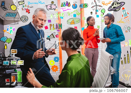 Business people that work together on a new creative project Business people that work together on a new creative project 106766007