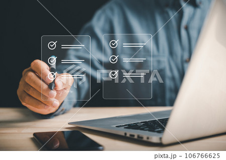Professional businessman utilizes pen to sign electronic documents on virtual screen. Showcases paperless office concept, e-signing, and effective document management. Agreement is established. Professional businessman utilizes pen to sign electronic documents on virtual screen. Showcases paperless office concept, e-signing, and effective document management. Agreement is established. 106766625