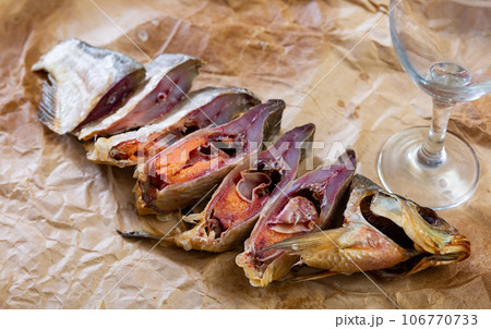Aromatic dried-cured bream served for snack 106770733