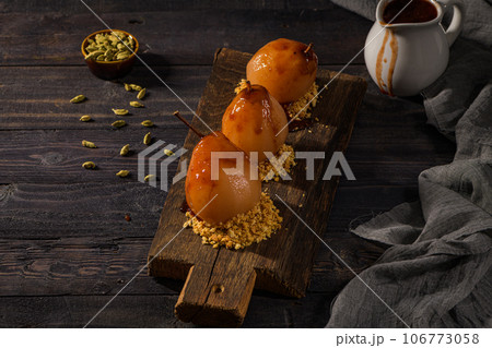 Poached pears 106773058