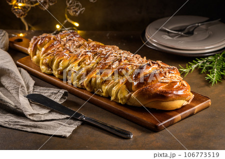 Christmas braided cinnamon cake Christmas braided cinnamon cake 106773519