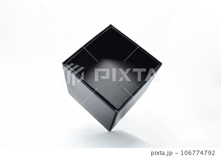 black paper box on white background, packaging industry 106774792