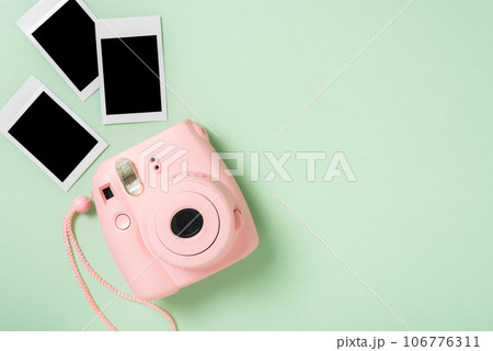 pink instant camera 106776311