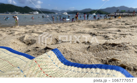 Outdoor Hong Kong beach with blurred poeple, mountains, boat background Outdoor Hong Kong beach with blurred poeple, mountains, boat background 106777057