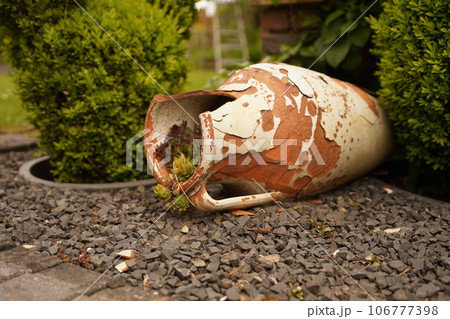 Broken pitcher of ornamental stones Broken pitcher of ornamental stones 106777398