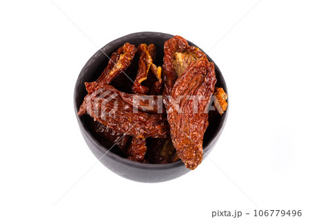 dried tomatoes on white background 106779496