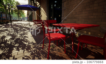 夕日に照らされた木陰とおしゃれなカフェのテーブル 106779868