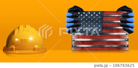 Happy Labor Day Concept - Gloved Hands Holding an American Flag Happy Labor Day Concept - Gloved Hands Holding an American Flag 106783625