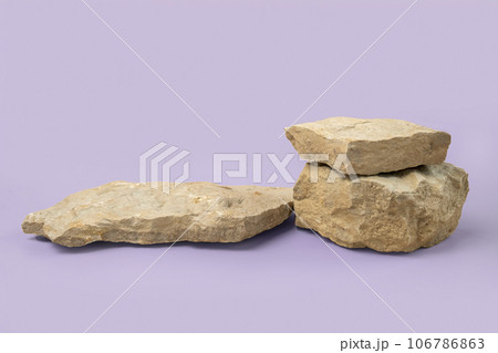 Stone podium for cosmetic, spa product presentation. Abstract minimal backdrop. Two rock form. Violet Studio Background. Scene to show. Showcase display case. 3D Front View. Trendy purple color. Space 106786863