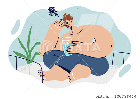 Man woke up from nightmare and sits on bed in bedroom with glass of water in hands Man woke up from nightmare and sits on bed in bedroom with glass of water in hands 106788454