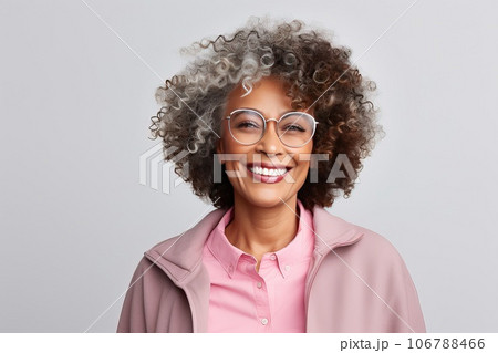 Close-up portrait of a happy beautiful African American woman in her 50s. Close-up portrait of a happy beautiful African American woman in her 50s. 106788466